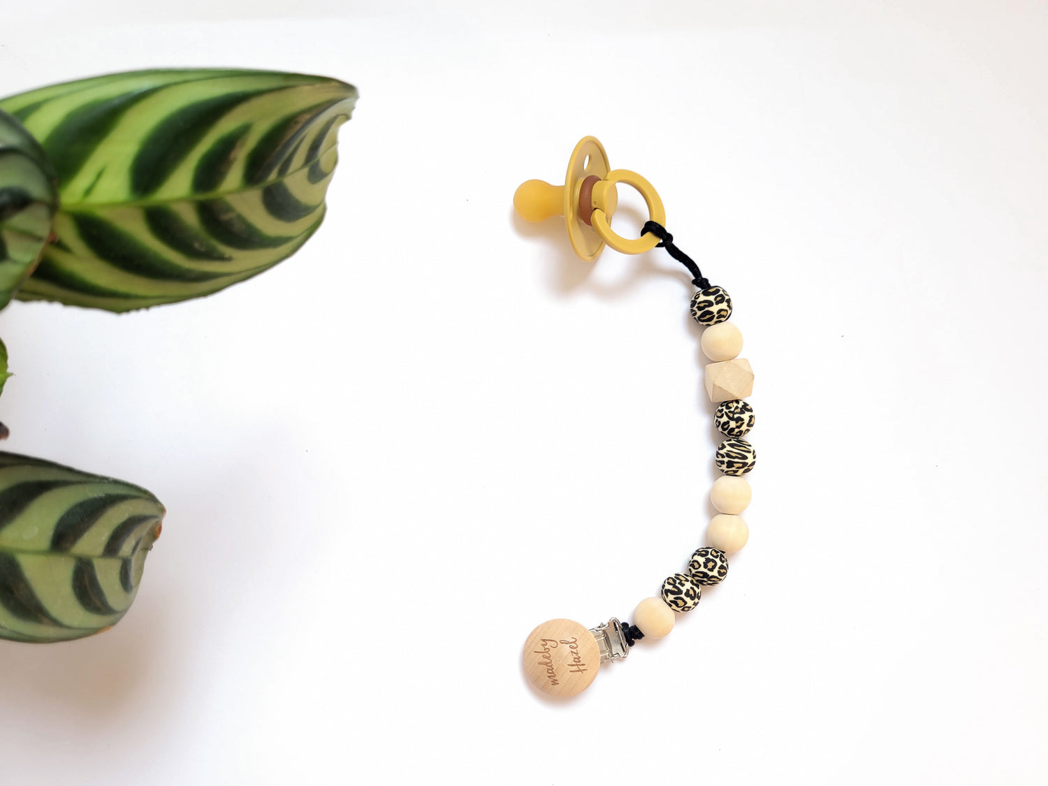 Baby-friendly dummy holders & pacifier clips.