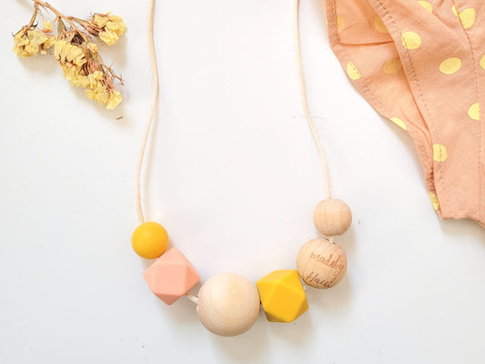 Stylish nursing necklace in non-toxic wood & silicone beads - Pink & Yellow! from madebyHazel