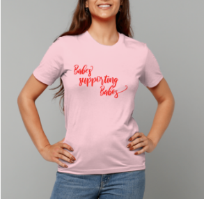 Woman in Babes supporting babes Pink Organic T-shirt with red text